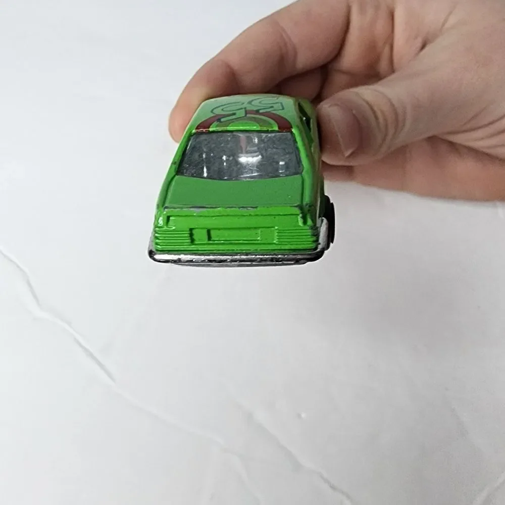 MERCEDES-BENZ 500 SEC  number 8803 can be found on inside Green Race Car #55